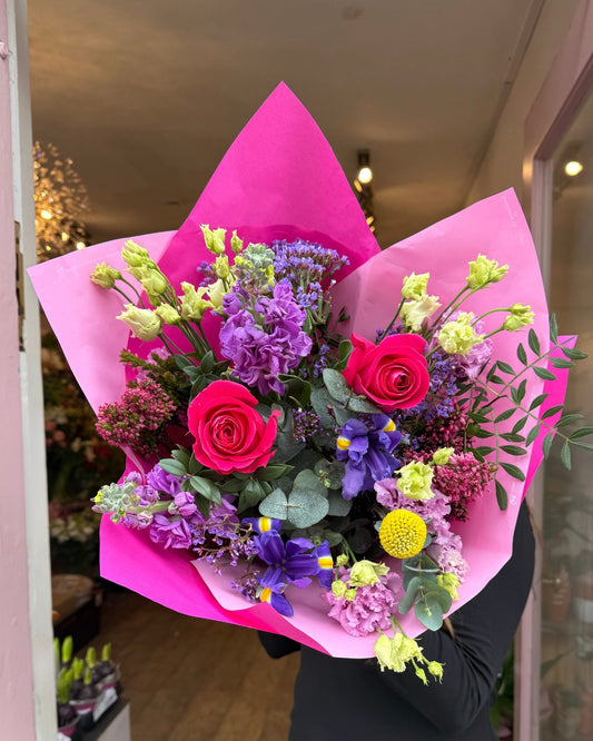Pink and purple Bouquet with roses, iris, lisianthus, stocks and more