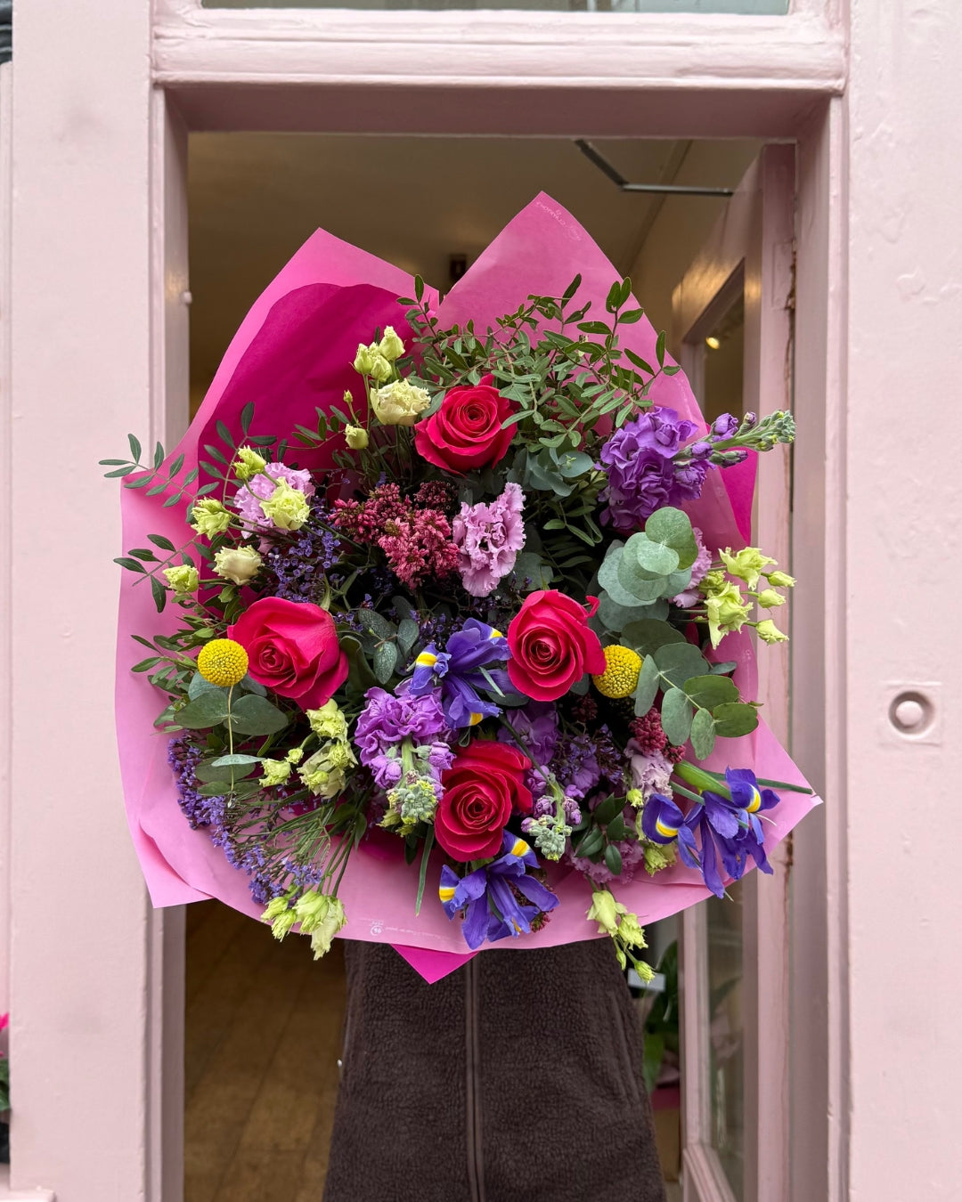Pink and purple Bouquet with roses, iris, lisianthus, stocks and more